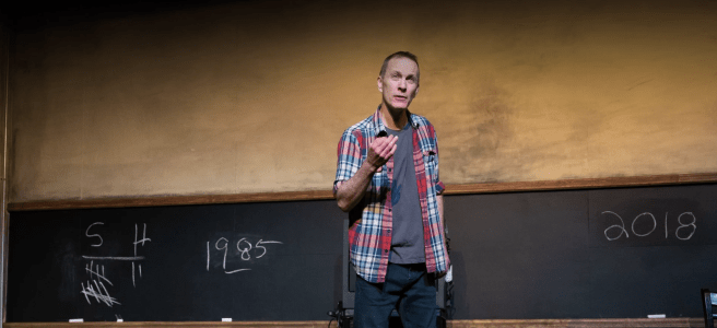 Jay Sefton on stage in his one-man show Unreconciled.